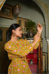 Bella – Mustard Floral Hand Printed Cotton Asymmetric Top with Booti Pants
