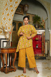 Bella – Mustard Floral Hand Printed Cotton Asymmetric Top with Booti Pants