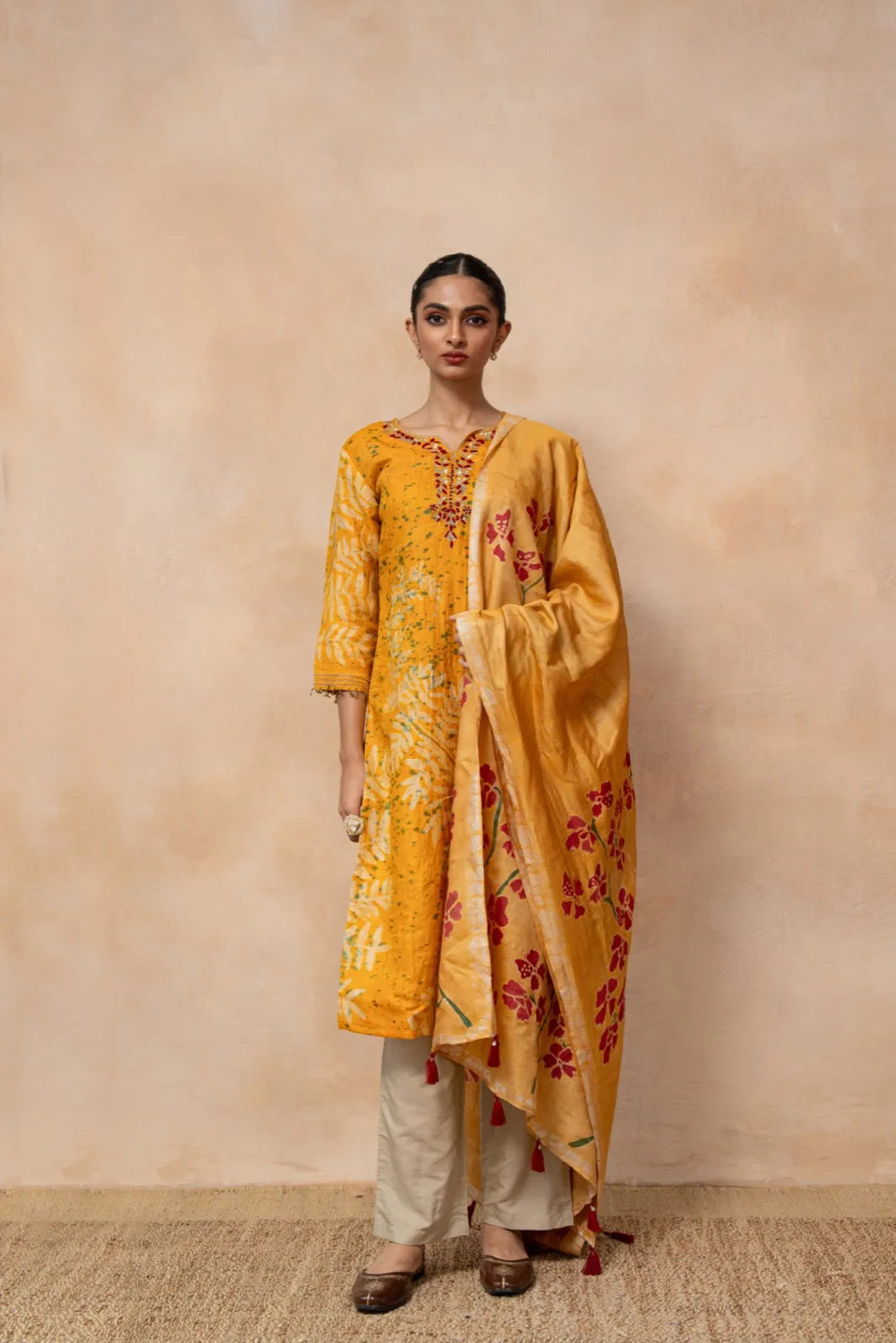 Swarnima – Mustard Hand Batik Tussar Silk Kurta Set with Floral Dupatta